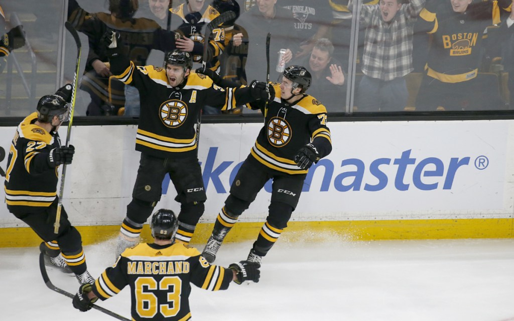 Bruins center Patrice Bergeron scores the first of his two third-period goals at 8:50 to tie the game at 2 on Thursday night against Florida. He scored the winning goal with 6.7 seconds left.