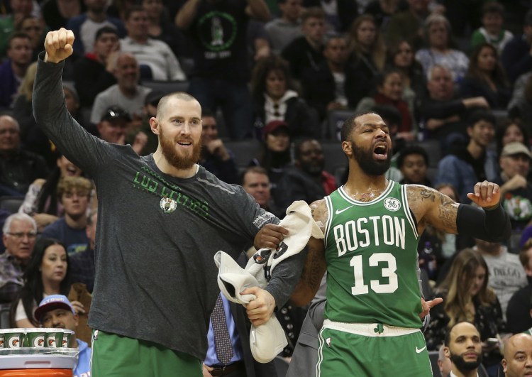 Now the Celtics are having fun with back-to-back wins on a West Coast trip, including Aron Baynes, left, and Marcus Morris.