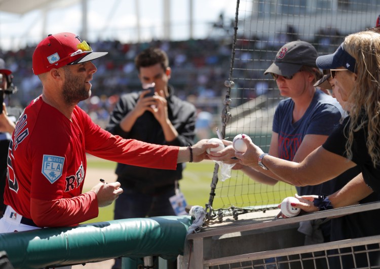 Red Sox fans have welcomed back second baseman Dustin Pedroia, seeking out autographs and giving him a standing ovation in his first at-bat of spring training. Pedroia played just three games last season after knee surgery.