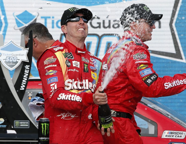 Now this is a common sight, Kyle Busch spraying champagne after a victory. He has 199 in his career, and counting.