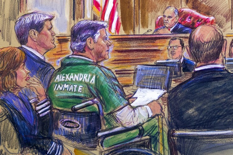 This March 7 courtroom sketch depicts former Trump campaign chairman Paul Manafort, center in a wheelchair, during his sentencing hearing in federal court before judge T.S. Ellis III in Alexandria, Va. Manafort was sentenced in a second case on Wednesday, bringing his total sentence to 7½ years.