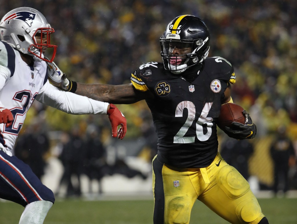 Le'Veon Bell played five seasons for the Pittsburgh Steelers before sitting out last fall over a contract dispute. (Winslow Townson/AP Images for Panini)