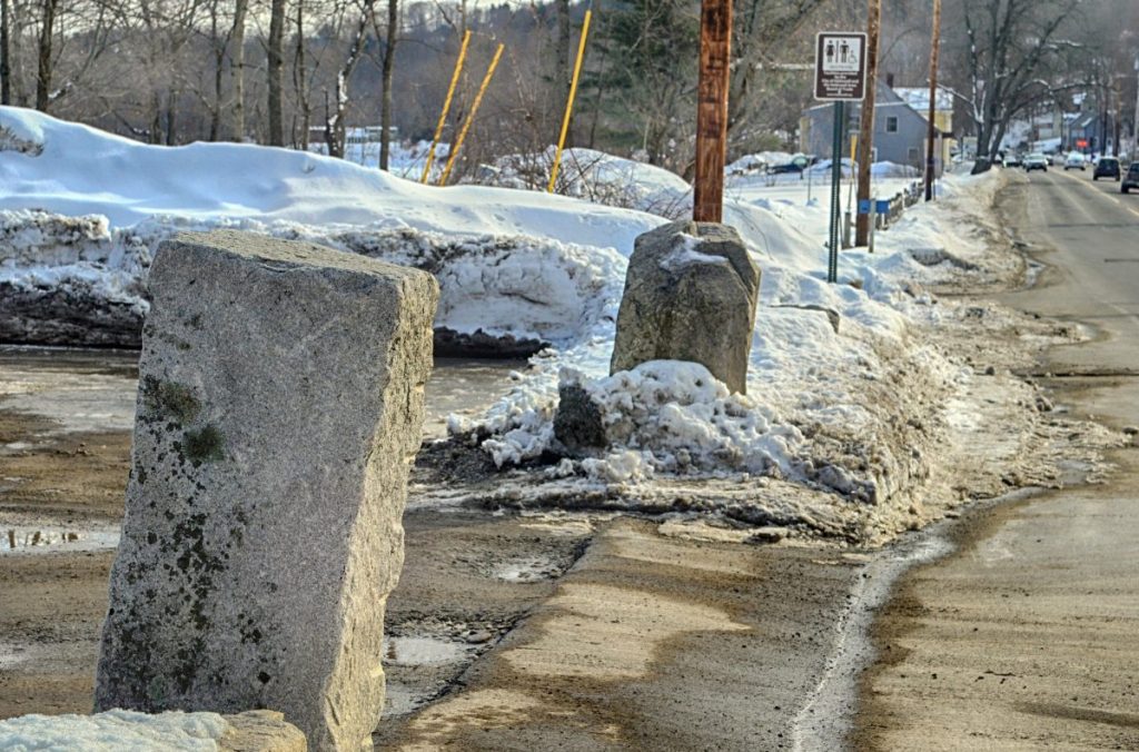 Kennebec Journal photo by Joe Phelan
The stone blocks flanking the Lucky Garden restaurant parking lot driveway in Hallowell. The state boat launch is seen in the background farther south on Water Street.