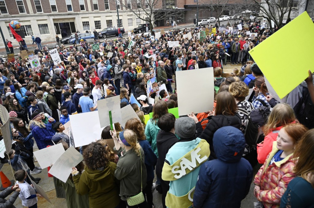 PORTLAND,ME - MARCH 15: Maine students take part in a global strike on the lack of action on climate change Friday, March 15, 2019. The students gathered outside City Hall in Portland among other places. (Staff photo by Shawn Patrick Ouellette/Staff Photographer)
