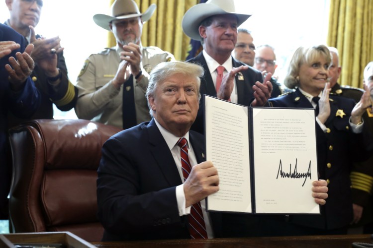 President Trump issues the first veto of his presidency Friday, overruling Congress to protect his emergency declaration for border wall funding.