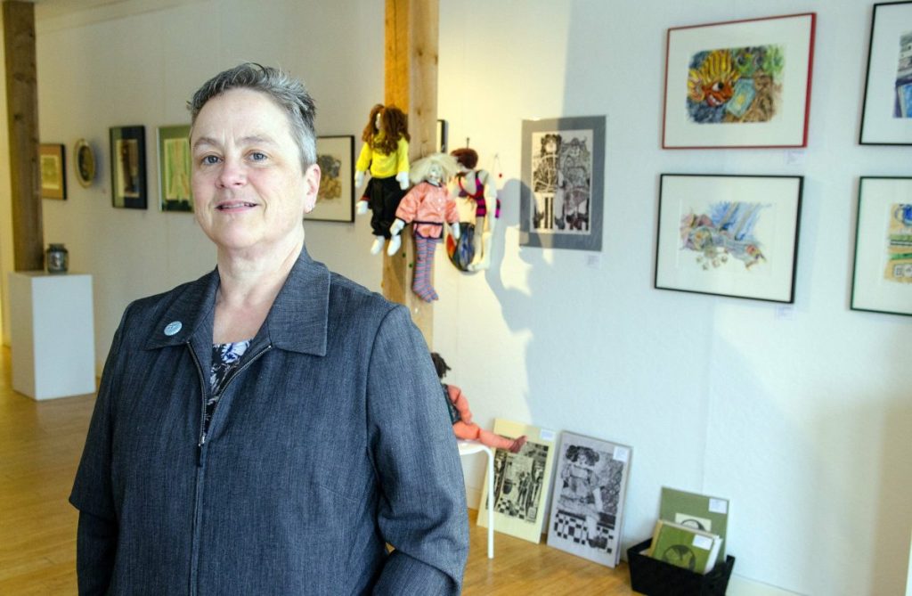 Kennebec Journal photo by Joe Phelan
Executive director Deb Fahy, who is stepping down as longtime executive director of the Harlow Gallery, is seen Friday at the Water Street gallery in Hallowell.
