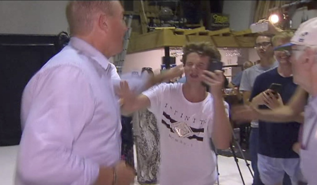 Australian Sen. Fraser Anning punches a teenager who broke an egg on his head while he was holding a news conference. Anning lunged for the 17-year-old again before the two were separated.