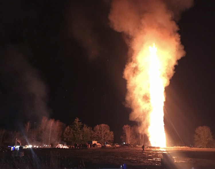Lustenau, Austria, achieved a new world record Saturday in the category tallest bonfire. Its 198-foot-high bonfire, above, replaced the 154.2-foot one of Alesund in Norway from 2016 in the Guinness book.