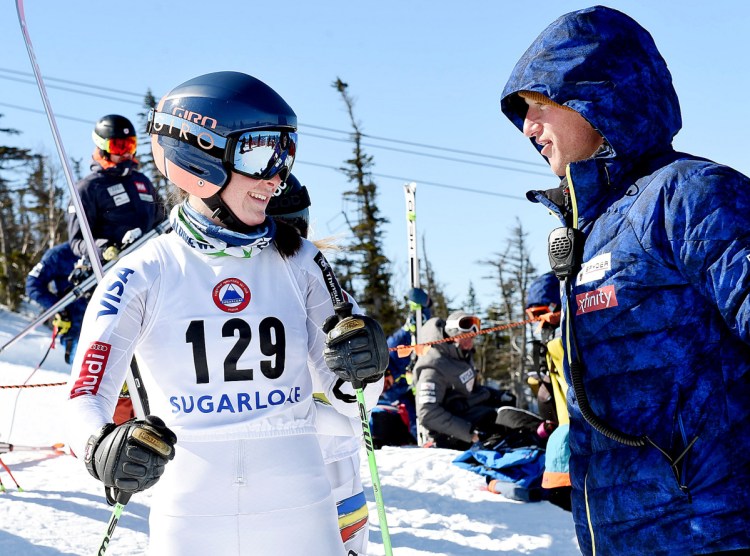 Ella Spear, left, talks with Brad Farrell, a U.S. ski team coach, before taking her first training run Monday at Sugarloaf. Spear, a native of Boothbay, will ski in a national meet.