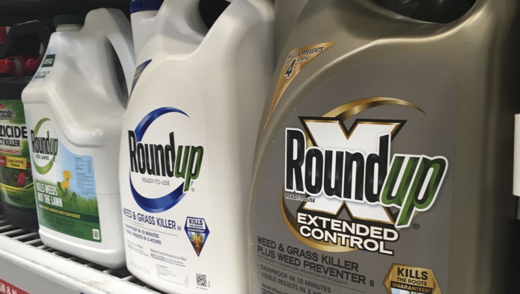 Containers of Roundup are displayed on a store shelf in San Francisco in February. Bayer maintains its weedkiller's active ingredient does not cause cancer.