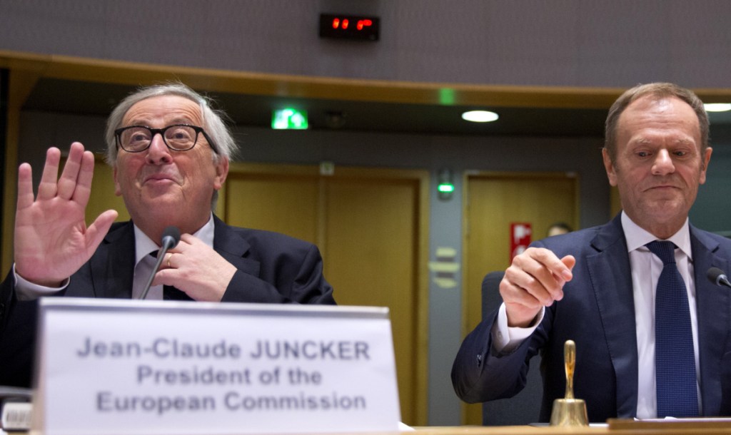 European Commission President Jean-Claude Juncker, left, and European Council President Donald Tusk prepare to open a meeting at the Europa building in Brussels, on Wednesday