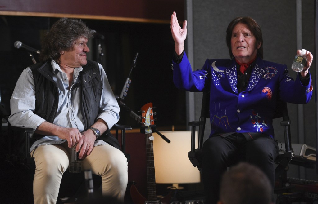 Woodstock co-founder Michael Lang, left, and musician John Fogerty discuss the lineup for the Woodstock 50 concert in August during an announcement at Electric Lady Studios in New York on Tuesday.