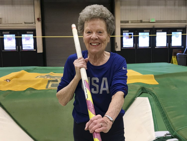 Florence "Flo" Filion Meiler, an 84-year-old record-setting pole vaulter, poses while training earlier this month. at the University of Vermont. 
