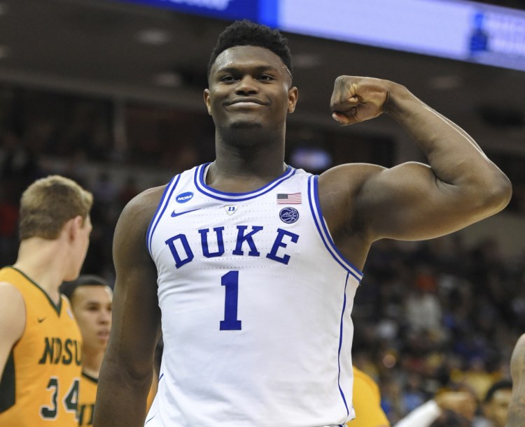 Duke's Zion Williamson flexes after a basket against North Dakota State in a first-round game in the NCAA tournament Friday night at Columbia, S.C. Williamson scored 25 points in Duke's 85-62 win.