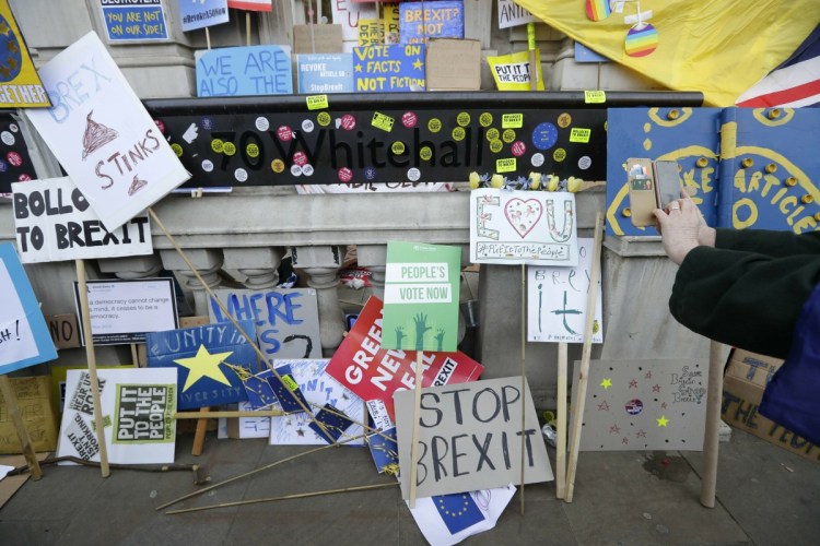 Placards and banners are placed outside the Cabinet offices during an anti-Brexit march in London on Saturday. 