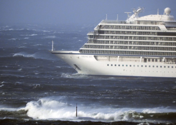 The cruise ship Viking Sky lays at anchor in heavy seas, after it sent out a mayday signal because of engine failure in windy conditions, off the coast of Norway.
