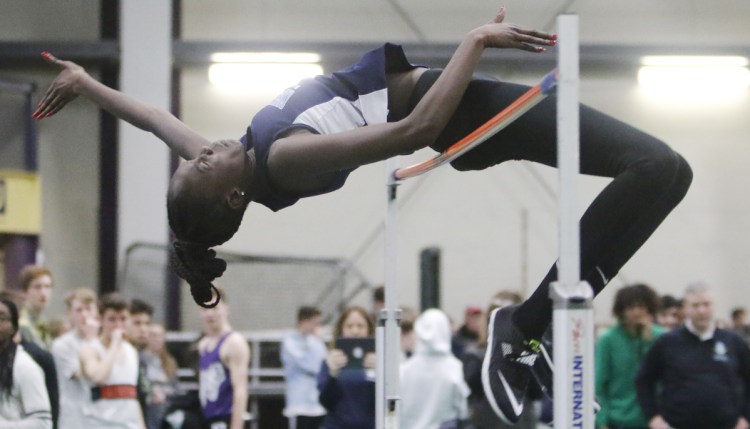 Nyagoa Bayak became the first Maine girl to clear 6 feet in the high jump, and went on to win the Class A and New England titles for a fourth straight year.