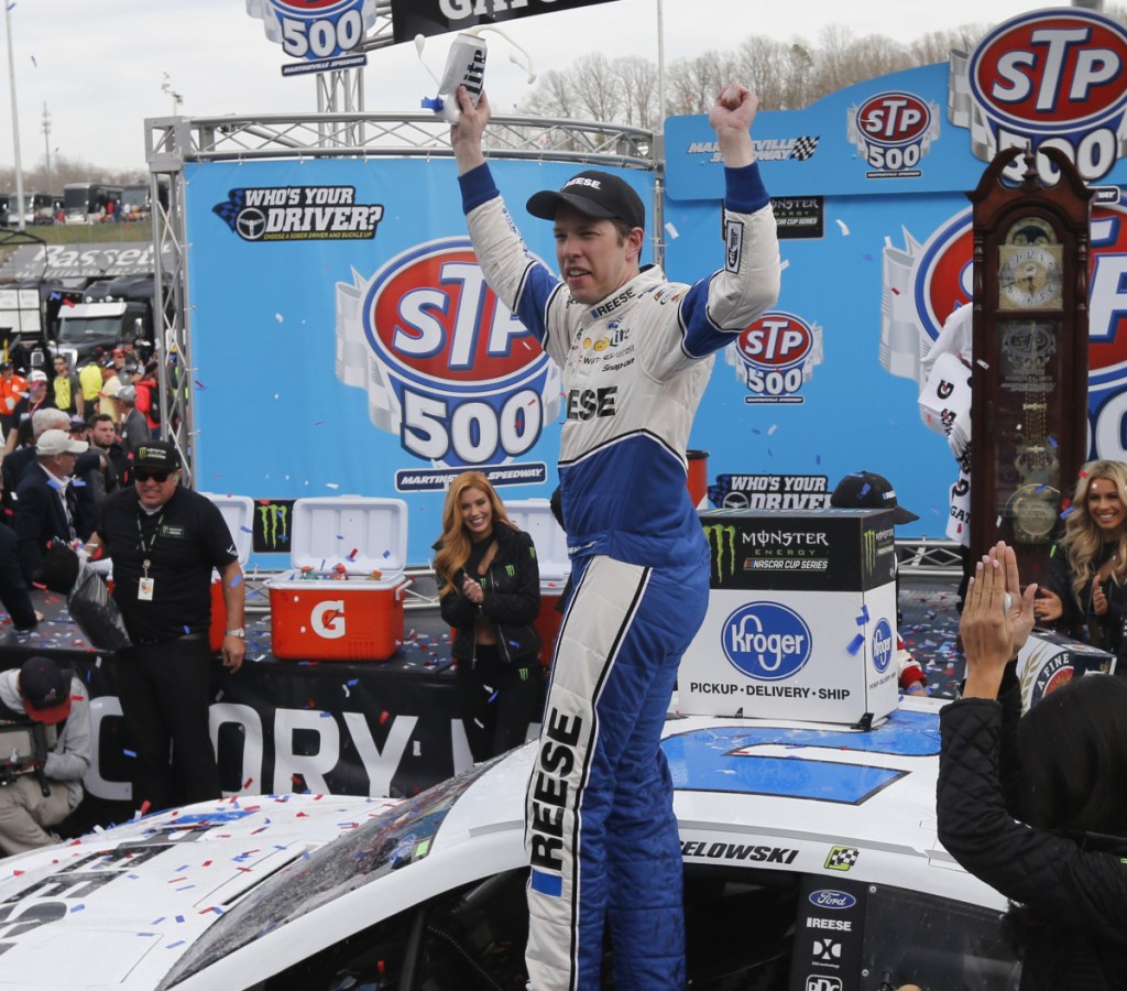 Brad Keselowski celebrates after easily winning the NASCAR Cup Series race Sunday at Martinsville Speedway in Virginia. Keselowski led 446 of 550 laps.