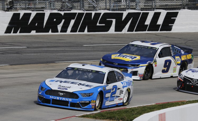 Brad Keselowski leads Chase Elliott during the NASCAR Cup Series race Sunday at Martinsville Speedway in Martinsville, Va. Keselowski led 446 laps and won the race.