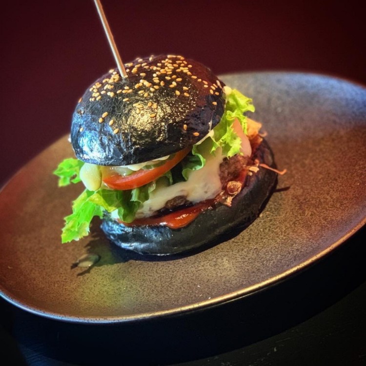 The Big Mami Burger, made with a squid ink brioche bun. 
