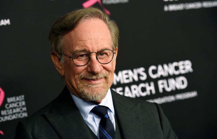 In this Thursday, Feb. 28, 2019, file photo, filmmaker Steven Spielberg poses at the 2019 "An Unforgettable Evening" benefiting the Women's Cancer Research Fund, at the Beverly Wilshire Hotel, in Beverly Hills, Calif. Reports that Spielberg intends to support rule changes that could block Netflix from Oscars-eligibility have provoked a heated and unwieldy online debate.