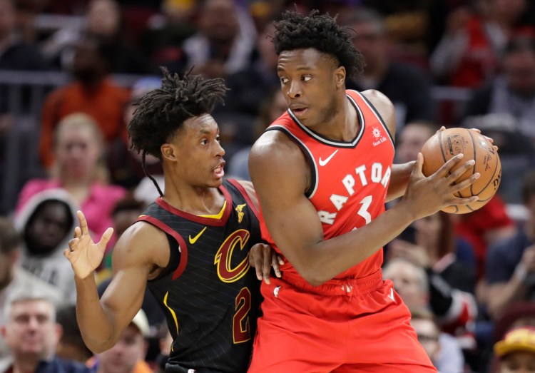 Toronto's OG Anunoby drives past Cleveland's Collin Sexton during the Cavaliers' 126-101 win in Cleveland.