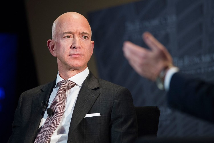 The Wall Street Journal reports that the National Enquirer's publisher paid $200,000 to obtain intimate texts between Amazon CEO Jeff Bezos, shown in September, and his mistress Lauren Sanchez.