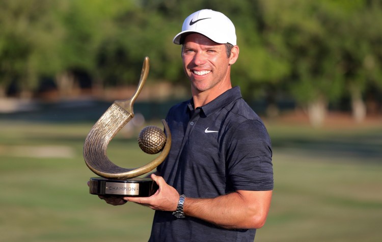 Paul Casey poses with the champions trophy after winning the Valspar Championship on Sundayin Palm Harbor, Fla. 