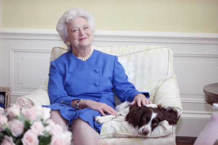 First Lady Barbara Bush, shown with her dog Millie in 1990, is described in a new book as suffering "angst" over the candidacy of Donald Trump. 
