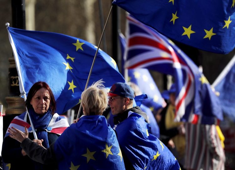 Brexit protesters demonstrate near the House of Parliament in London on Tuesday.