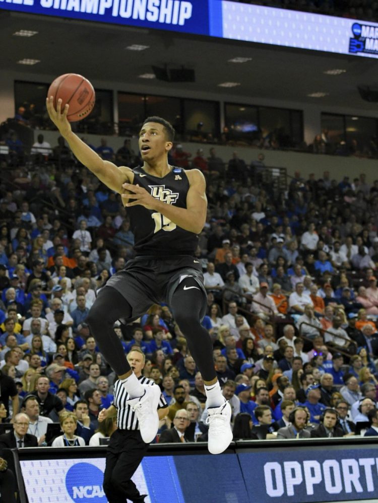 Central Florida's Aubrey Dawkins drives in for a layup during the first half of Sunday's game against Duke. Dawkins missed at the buzzer, sending Duke to a win.