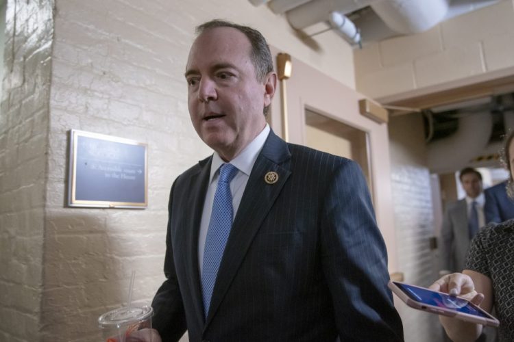 House Intelligence Committee Chairman Adam Schiff, D-Calif., arrives for a Democratic Caucus meeting at the Capitol in Washington, Tuesday, March 26, 2019. Schiff, the focus of Republicans' post-Mueller ire, says Mueller's conclusion would not affect his own committee's counterintelligence probes. 