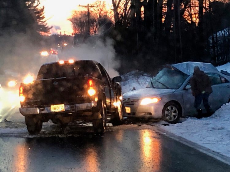 Westbrook police have asked for potential eyewitnesses to Monday morning's fatal crash on County Road to come forward. They say this photo, taken by a witness seconds after the crash, shows an unknown man standing at the driver's window of the taxi in which three men died.