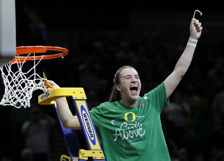 Oregon guard Sabrina Ionescu celebrates a regional final victory over Mississippi State in the NCAA women's college basketball tournament Sunday, March 31, 2019, in Portland, Ore. Oregon defeated Mississippi State 88-84. (AP Photo/Steve Dipaola)