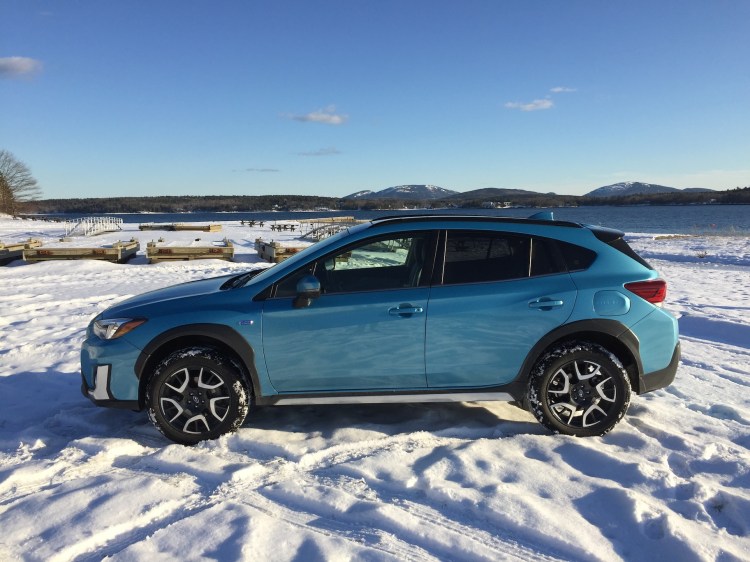 The Crosstrek is still available as a budget crossover, ($21,995); the writer's fully equipped Crosstrek Hybrid is $34,995 base, $38,470 as shown. Photo by TIm Plouff, at Lamoine State Park. Mount Desert Island is in the distance.