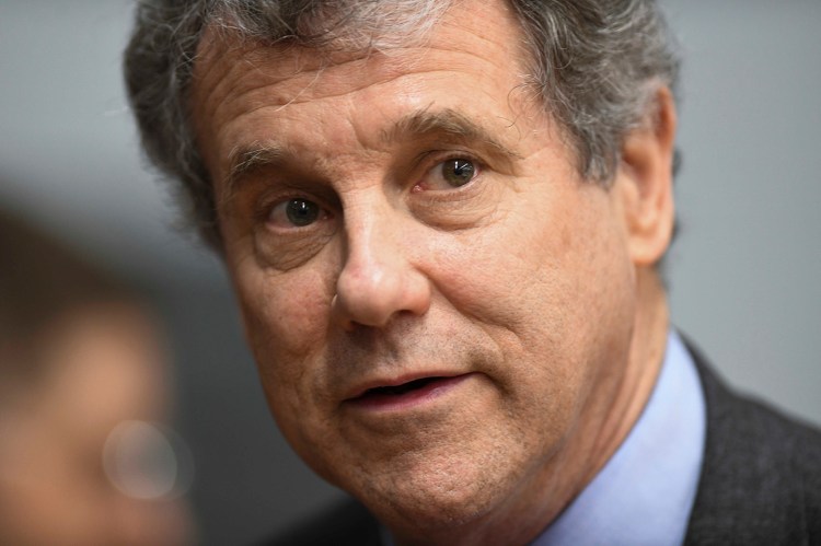 U.S. Sen. Sherrod Brown, D-Ohio, speaks to reporters during the Martin Luther and Coretta Scott King Unity Breakfast Sunday, March 3, 2019, in Selma, Ala.  
