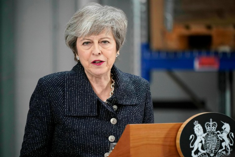 Britain's Prime Minister Theresa May addresses factory workers in the staunchly pro-Brexit northern England port town of Grimsby on Friday.