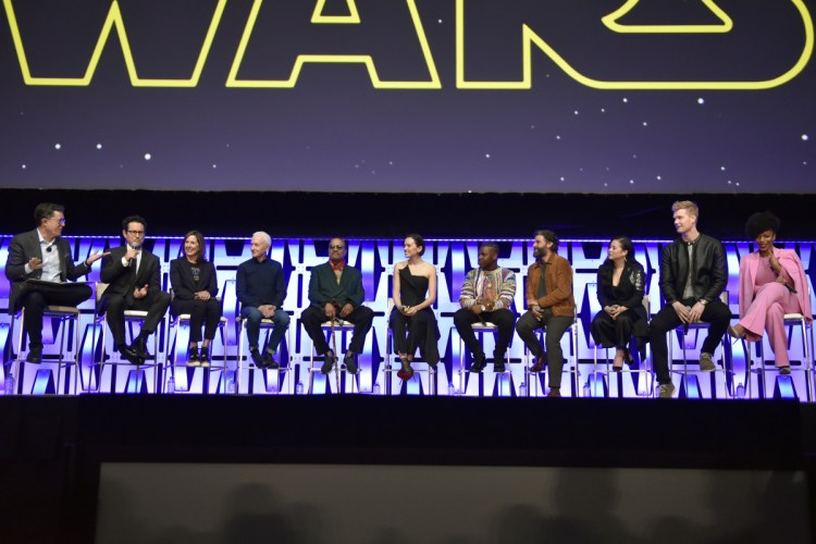 Stephen Colbert, from left, J.J. Abrams, Kathleen Kennedy, Anthony Daniels, Billy Dee Williams, Daisy Ridley, John Boyega, Oscar Isaac, Kelly Marie Tran, Joonas Suotamo and Naomi Ackie participate in the "Star Wars: The Rise of Skywalker" panel on day 1 of the Star Wars Celebration at Wintrust Arena on Friday, April 12, 2019, in Chicago. (Photo by Rob Grabowski/Invision/AP)