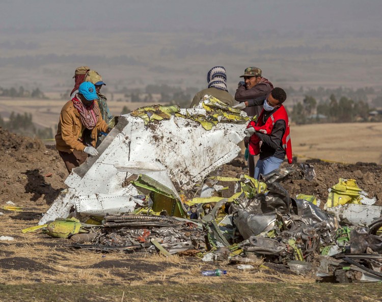 Rescuers work at the scene of the Ethiopian Airlines flight crash near Bishoftu, Ethiopia in March.