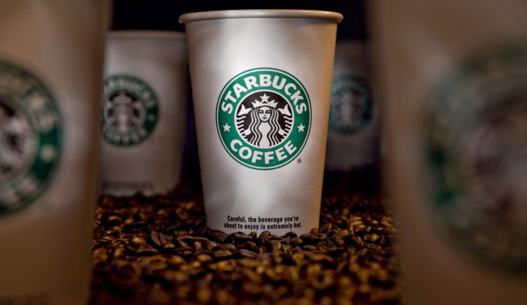 Chains like Starbucks want better cups than the plastic lined, plastic-lidded ones in use now.