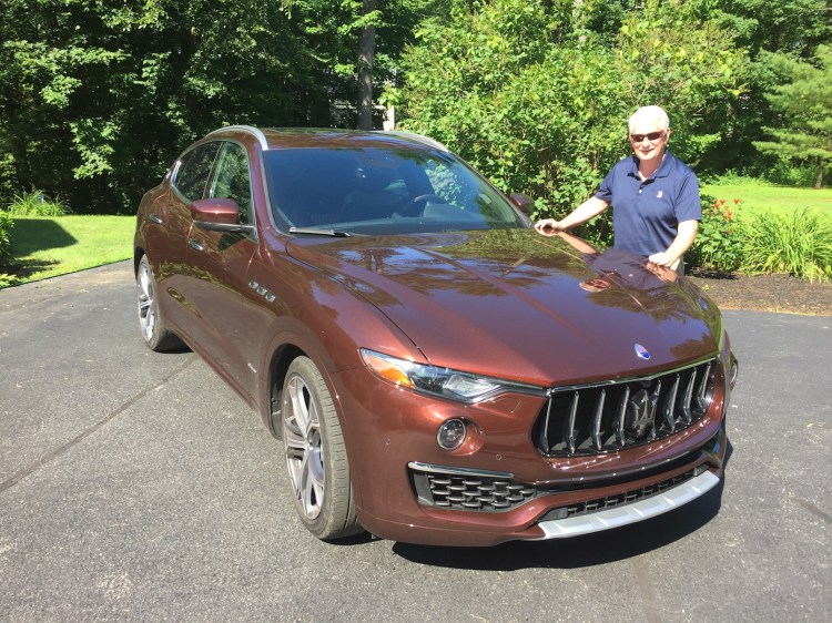 Bill Green of "Bill Green's Maine" drives as many as 50,000 miles a year around the state, but not in a Maserati, as a rule. Photo by Tim Plouff. Location: Cumberland.