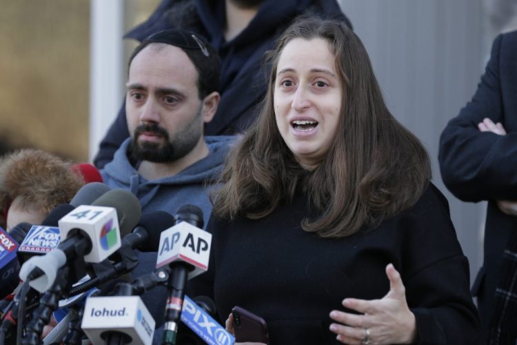 Nicky Cohen, daughter of Josef Neumann, who was critically injured in an attack on a Hanukkah celebration, speaks to reporters in front of her home in New City, N.Y., on Thursday. Her 72-year-old father has been unconscious since he was wounded Saturday in a machete attack at a rabbi's home in Monsey, N.Y. Attacks on minority religious groups strike at the heart of community life, two letter writers say. 