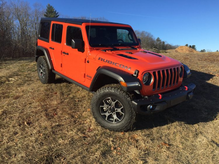 The EcoDiesel earns 22/29/25-mpg, a giant seven-mile-per-gallon jump over the regular V-6. Over 750-miles together, our reviewer's Sunset Orange Rubicon returned exactly 25-mpg. Total range is over 500-miles per tank.
