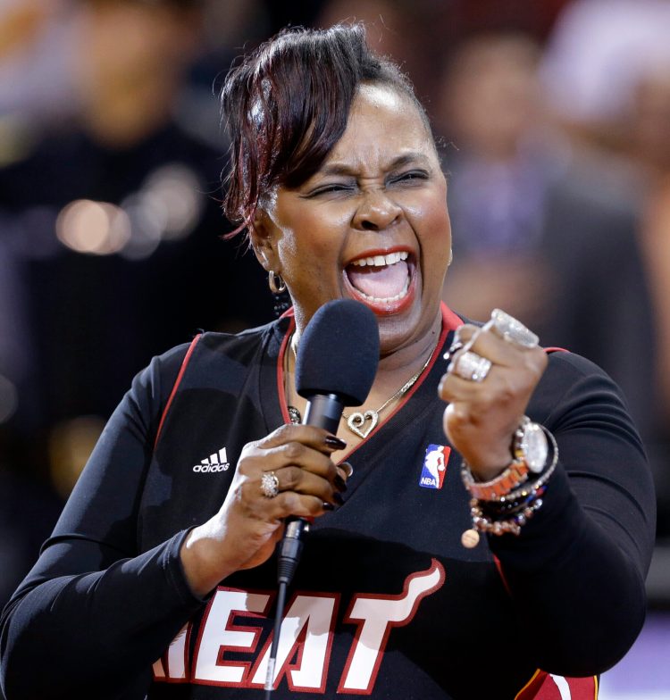 Singer Betty Wright performs the national anthem before an NBA basketball game between the Miami Heat and the New York Knicks in Miami in 2013. Wright, the Grammy-winning soul singer and songwriter whose influential 1970s hits included “Clean Up Woman” and “Where is the Love,” died Sunday.