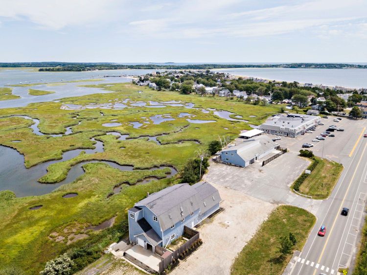 Aerial view of the two properties at 350 Pine Point Rd. Clambake Seafood is at the top of the photo.