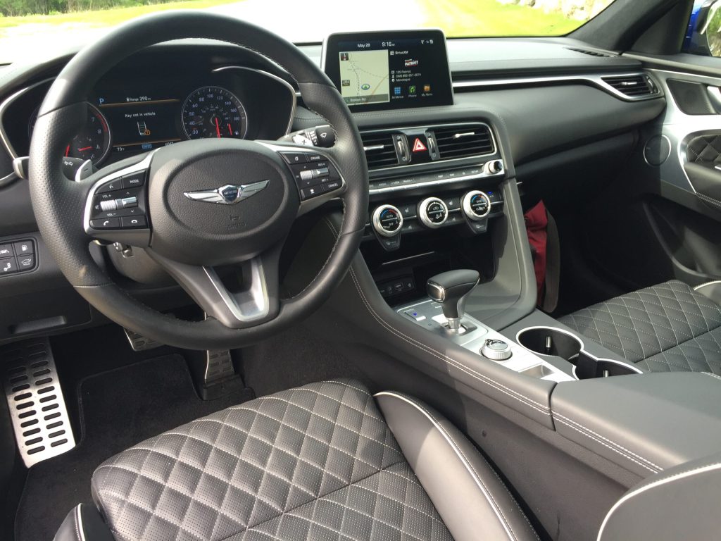 Sport trim ($5,600) brings ventilated and heated quilted leather seating, HID-display, power tilt/telescoping steering column, navigation/info screen with Apple/Android compatibility, plus selectable drive modes. 