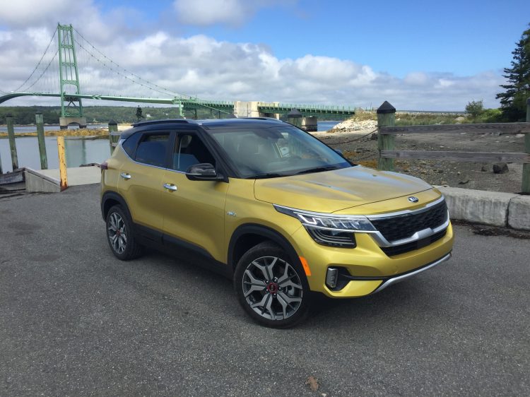 The Seltos immediately sets itself apart from its primary rivals with more distinctive styling—brilliant Starbright Yellow paint and a black roof.. $21,990 is the base price, shown here at $29,485.