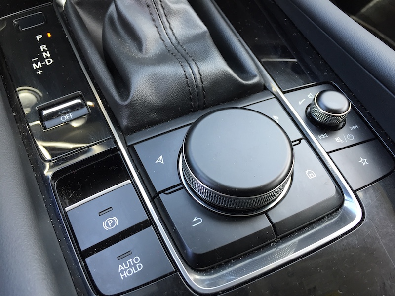 Our reviewer found Mazda’s lane keeping assist sensor startling,  forcibly applying steering pressure while shaking the wheel, sounding an alarm. However, there is a deactivation button on the dash.