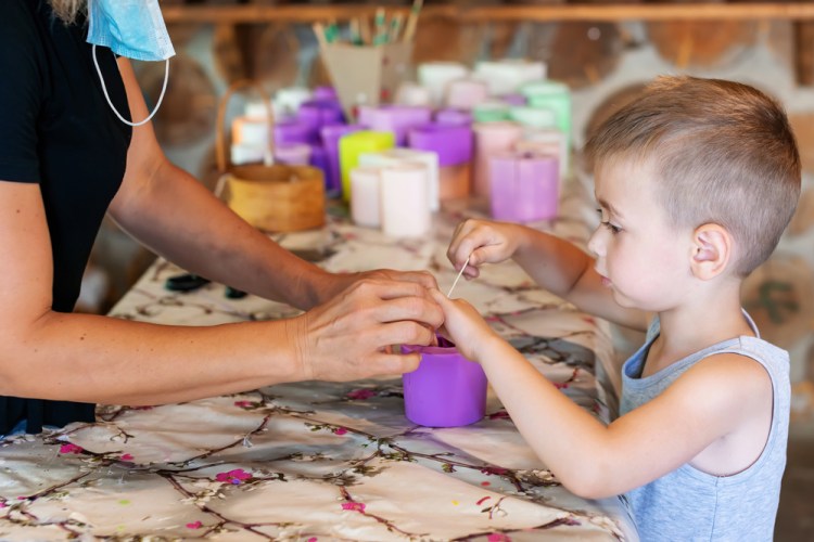 Making gifts for people this year, like unique candles, could be a great family activity.