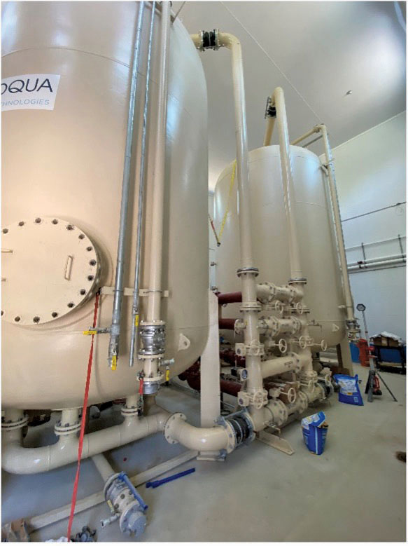 Newly installed drinking water filtration tanks in Merrimack, N.H. hold granular activated carbon, which can  remove certain PFAS chemicals out of the supply.